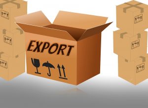 A cardboard box with the word export written on it and a lot of cardboard boxes in the background.