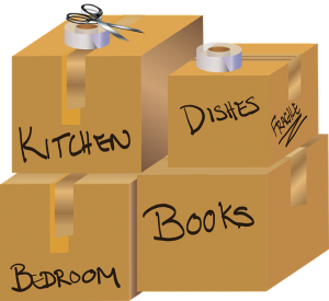 Four cardboard boxes with names of rooms written all over - one of the ways you can help your child move out