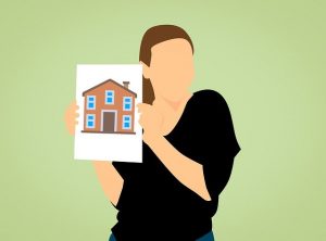 Graphic - A faceless woman holds a drawing of a house